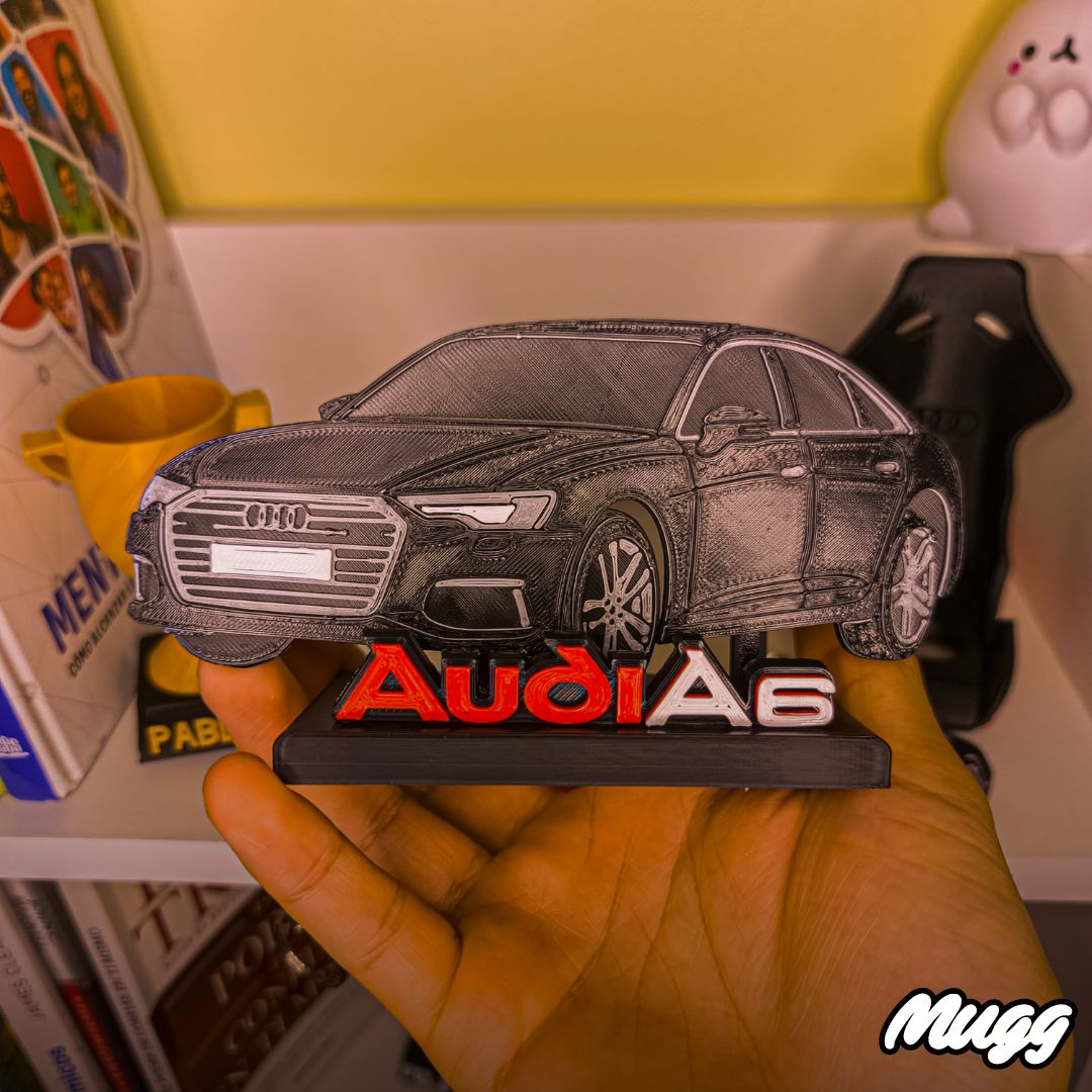 Trofeo negro personalizado de cerca de auto